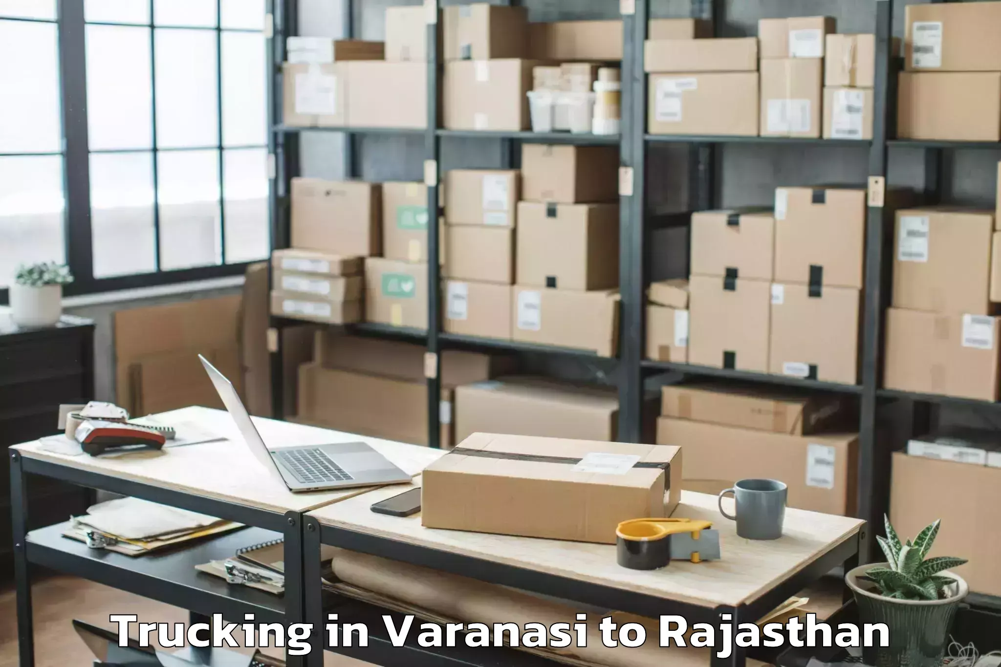 Book Varanasi to Jamwa Ramgarh Trucking